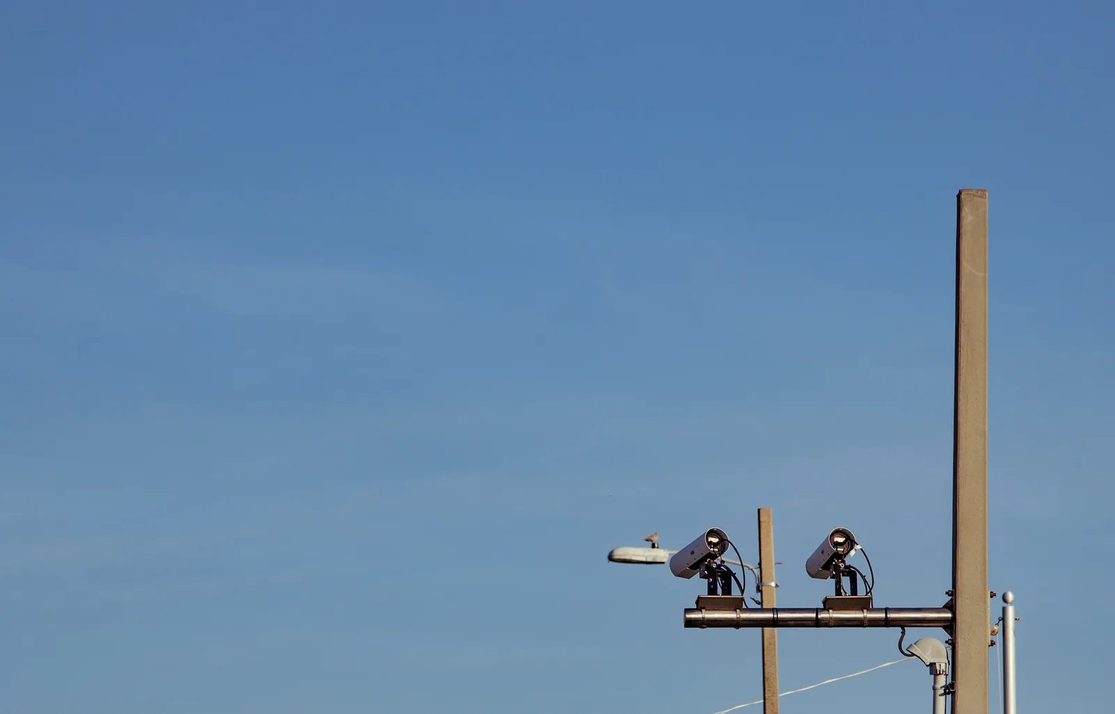 License plate reader cameras on a pole at the entrance to Pensacola Beach, Fla. The picture does not show a Boynton Beach camera.