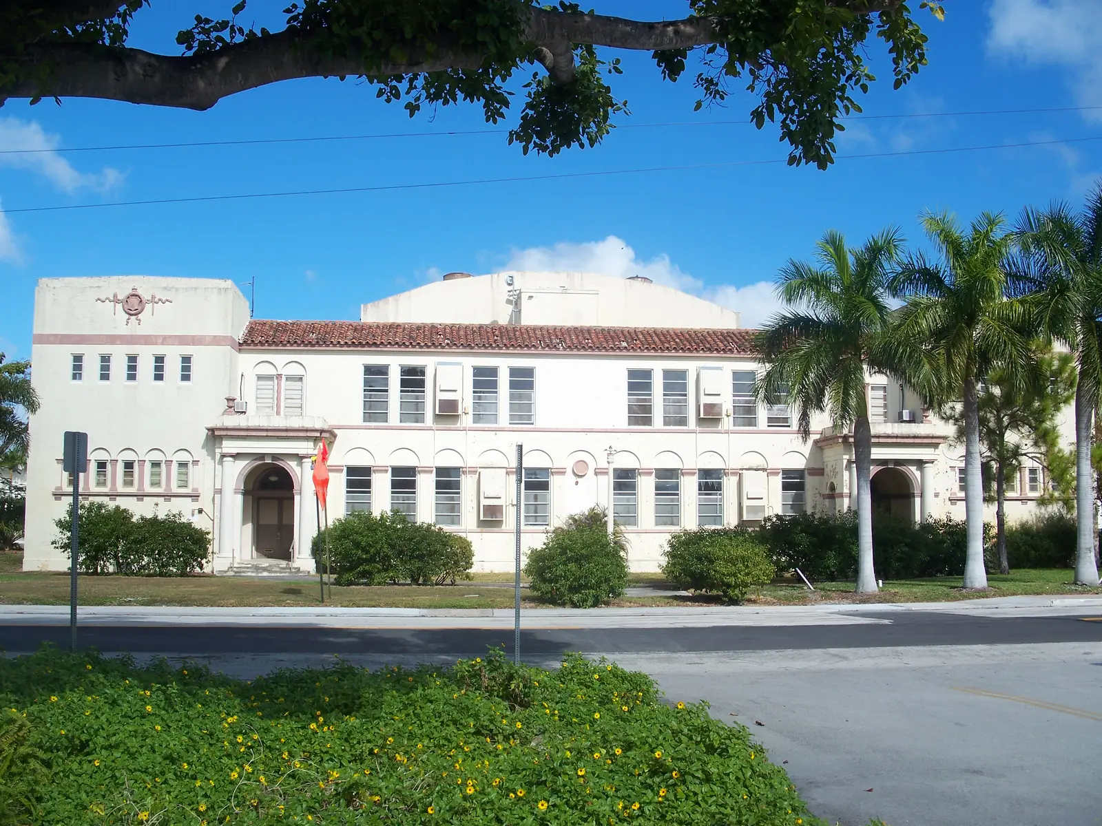 The 1927 Boynton High School building on East Ocean Avenue, now the city's Arts & Cultural Center, beside the Kapok Park playgrounds.