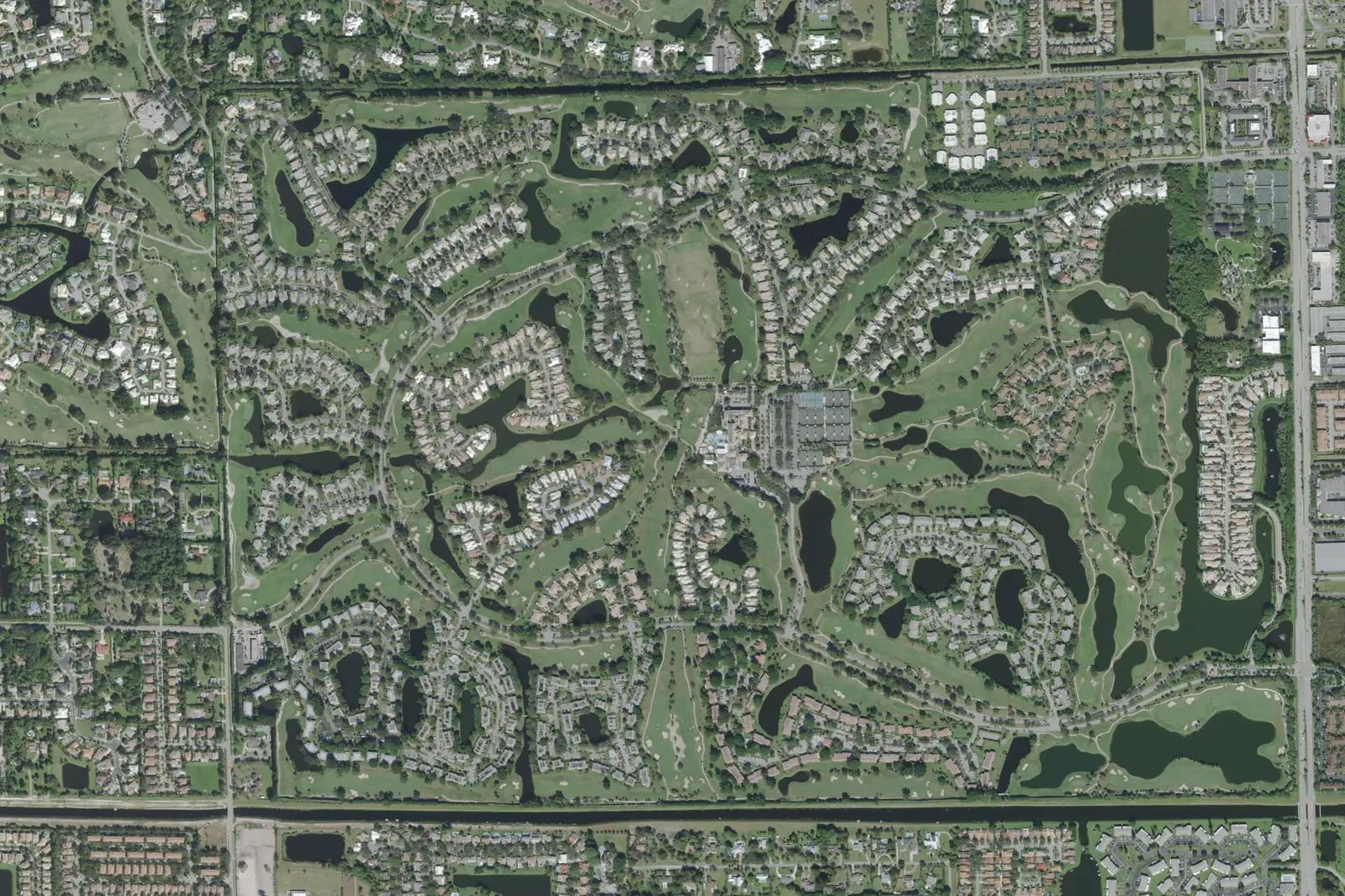 Hunters Run, its homes set among golf fairways and lakes west of Congress Avenue, in a USDA aerial photograph from the 2021 Florida survey
