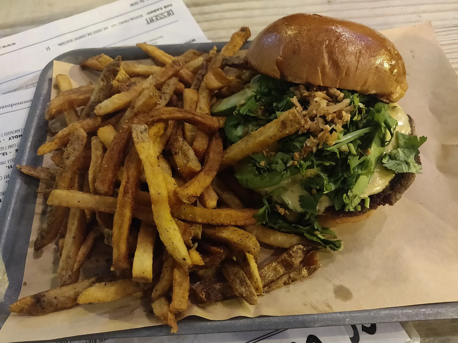 A cheeseburger and fries. The photo was not taken at a Boynton Beach restaurant.